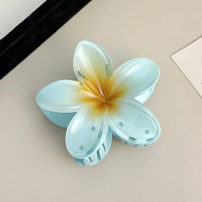 Tropical Blossom Hair Clip – The Floral Touch Your Summer Needs"